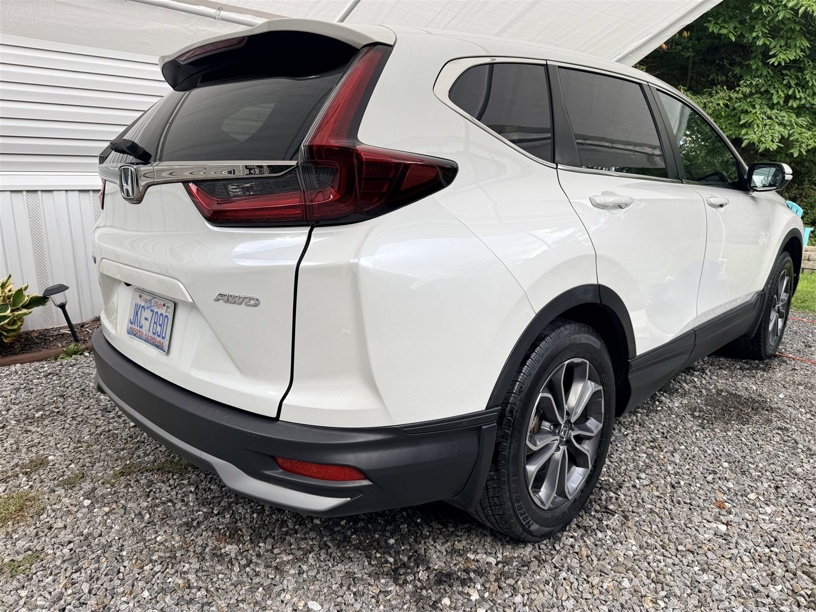 Detailed white Honda CR-V viewed from the rear